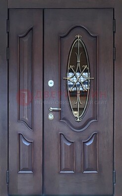 Темная металлическая дверь Винорит со стеклом и ковкой ДСК-239 в Екатеринбурге