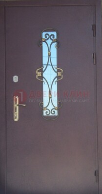 Металлическая дверь со стеклом и ковкой ДСК-77 в Екатеринбурге