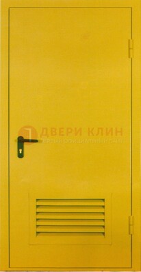 Желтая металлическая противопожарная дверь с вентиляционной решеткой ДТ-15 в Екатеринбурге